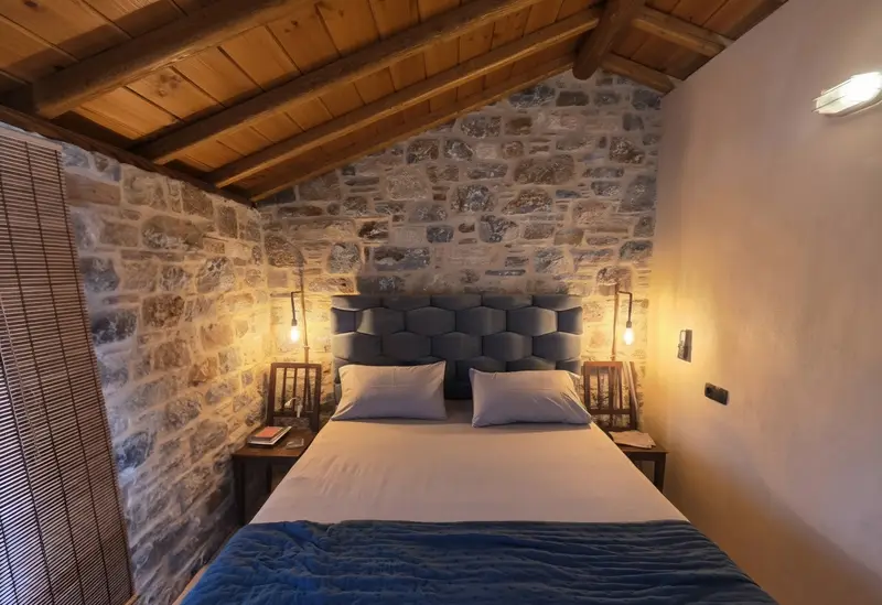 Bedroom with a blue headboard under a wooden roof
